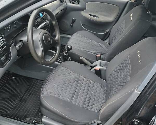 Черный Дэу Ланос, объемом двигателя 1.5 л и пробегом 158 тыс. км за 1250 $, фото 6 на Automoto.ua