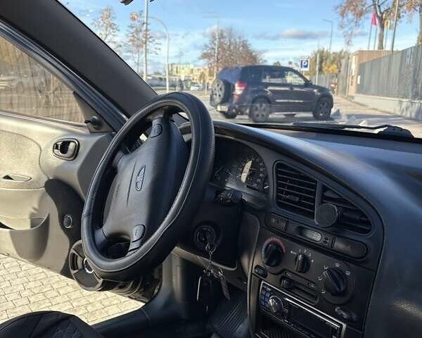 Дэу Ланос 2007 в Киеве на Automoto.ua Черный Дэу Ланос, объемом двигателя 1.6 л и пробегом 190 тыс. км за 2800 $, фото 7 на Automoto.ua