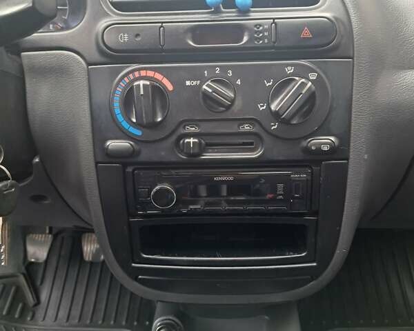 Черный Дэу Ланос, объемом двигателя 1.5 л и пробегом 158 тыс. км за 1250 $, фото 7 на Automoto.ua