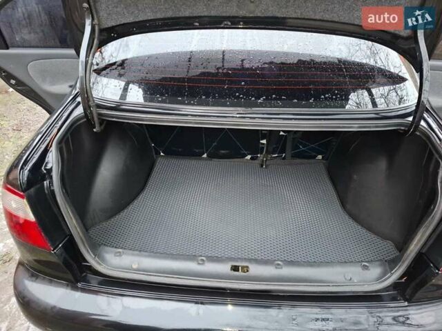 Чорний Деу Ланос, об'ємом двигуна 1.6 л та пробігом 63 тис. км за 4200 $, фото 5 на Automoto.ua