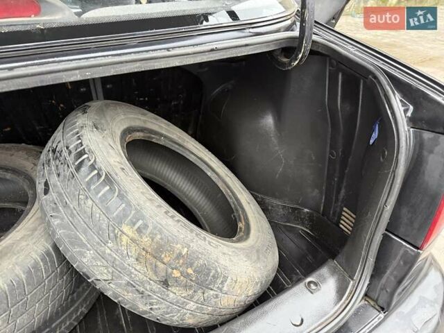 Черный Дэу Ланос, объемом двигателя 0 л и пробегом 150 тыс. км за 1250 $, фото 14 на Automoto.ua