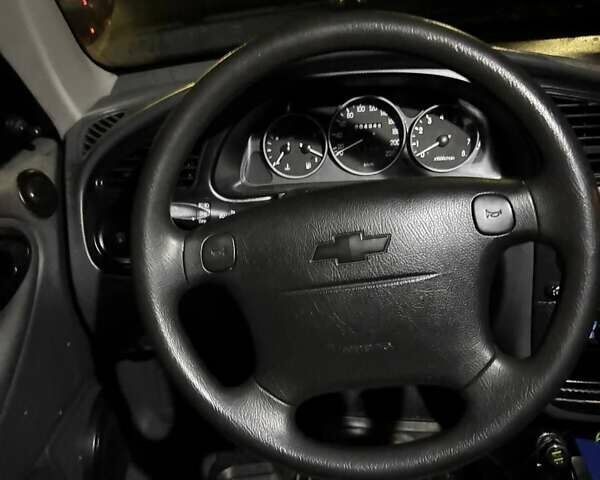 Черный Дэу Ланос, объемом двигателя 1.5 л и пробегом 210 тыс. км за 2199 $, фото 10 на Automoto.ua