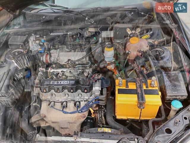 Черный Дэу Ланос, объемом двигателя 1.5 л и пробегом 310 тыс. км за 1700 $, фото 8 на Automoto.ua