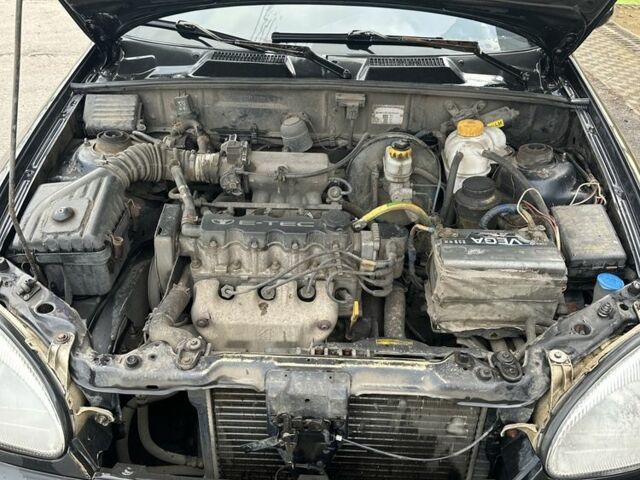 Черный Дэу Ланос, объемом двигателя 1.5 л и пробегом 150 тыс. км за 1700 $, фото 11 на Automoto.ua