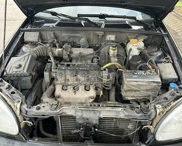 Чорний Деу Ланос, об'ємом двигуна 1.5 л та пробігом 150 тис. км за 1700 $, фото 11 на Automoto.ua