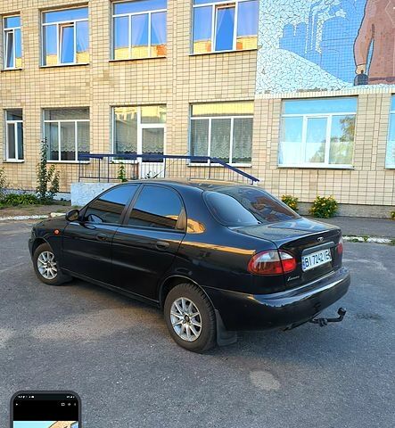 Черный Дэу Ланос, объемом двигателя 1.5 л и пробегом 155 тыс. км за 2600 $, фото 3 на Automoto.ua