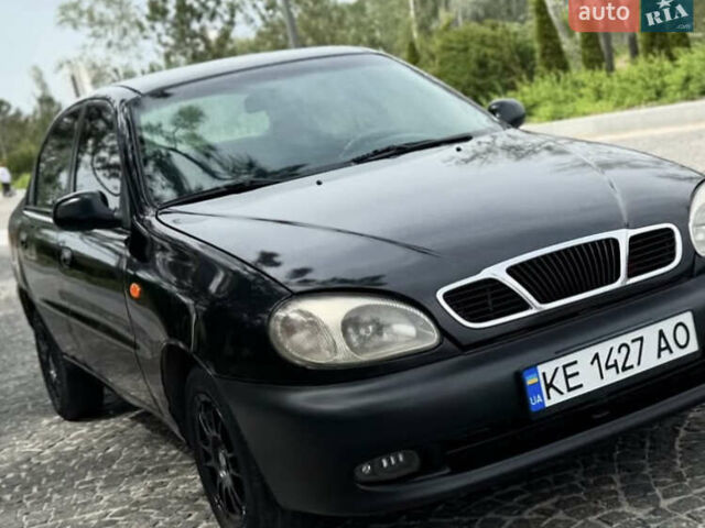 Черный Дэу Ланос, объемом двигателя 1.5 л и пробегом 233 тыс. км за 2200 $, фото 1 на Automoto.ua