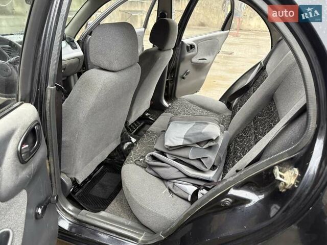 Черный Дэу Ланос, объемом двигателя 0 л и пробегом 150 тыс. км за 1250 $, фото 9 на Automoto.ua