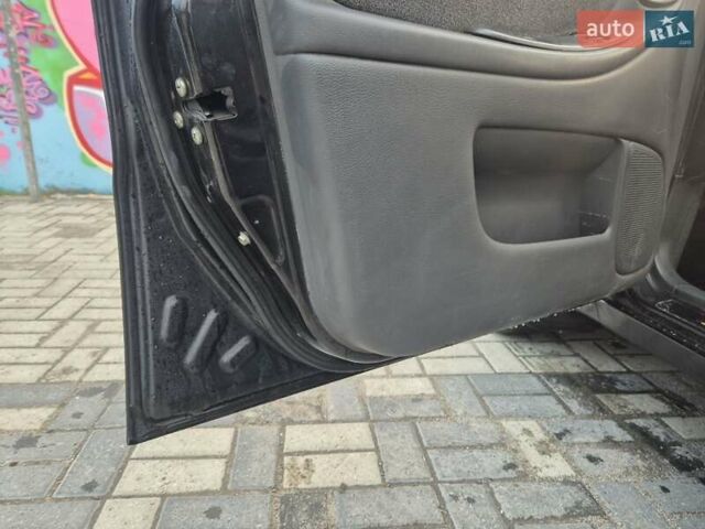 Деу Ланос 2007 у Новомосковске на Automoto.ua Чорний Деу Ланос, об'ємом двигуна 1.5 л та пробігом 252 тис. км за 2500 $, фото 12 на Automoto.ua