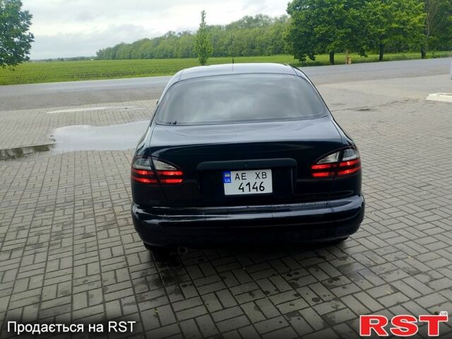 Черный Дэу Ланос, объемом двигателя 1.6 л и пробегом 249 тыс. км за 3500 $, фото 2 на Automoto.ua