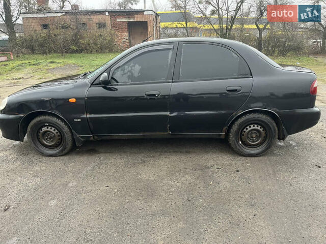 Черный Дэу Ланос, объемом двигателя 1.5 л и пробегом 201 тыс. км за 1000 $, фото 1 на Automoto.ua