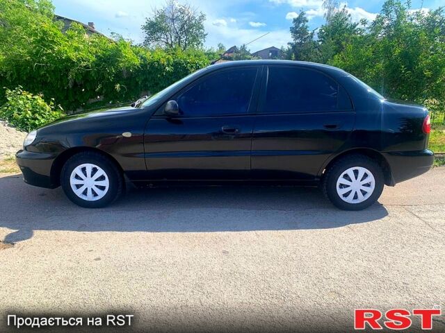 Черный Дэу Ланос, объемом двигателя 1.5 л и пробегом 255 тыс. км за 3200 $, фото 2 на Automoto.ua