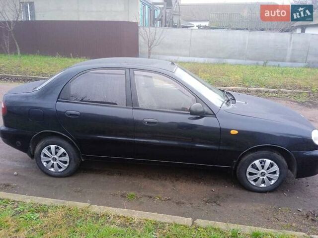 Черный Дэу Ланос, объемом двигателя 1.5 л и пробегом 230 тыс. км за 2350 $, фото 1 на Automoto.ua