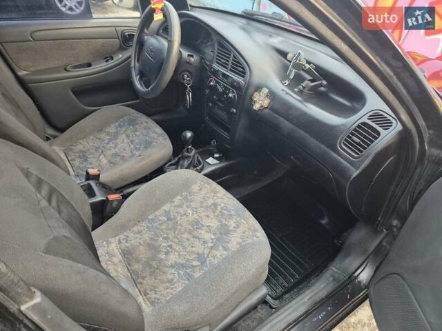 Деу Ланос 2007 у Новомосковске на Automoto.ua Чорний Деу Ланос, об'ємом двигуна 1.5 л та пробігом 252 тис. км за 2500 $, фото 14 на Automoto.ua