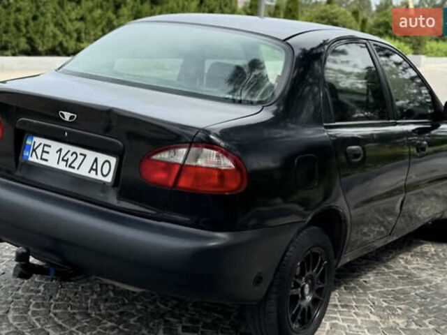 Черный Дэу Ланос, объемом двигателя 1.5 л и пробегом 233 тыс. км за 2200 $, фото 3 на Automoto.ua