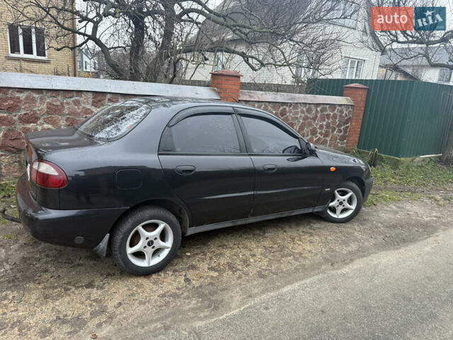Чорний Деу Ланос, об'ємом двигуна 1.5 л та пробігом 175 тис. км за 2600 $, фото 1 на Automoto.ua