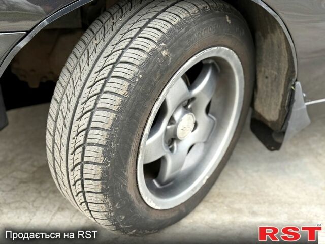 Чорний Деу Ланос, об'ємом двигуна 1.5 л та пробігом 240 тис. км за 2750 $, фото 12 на Automoto.ua