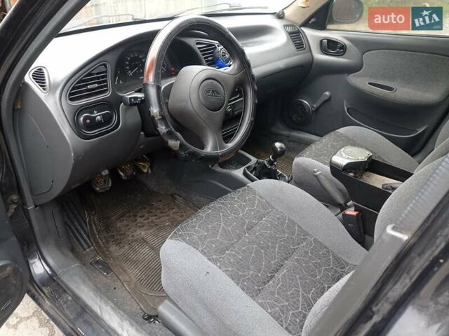 Черный Дэу Ланос, объемом двигателя 1.5 л и пробегом 141 тыс. км за 1700 $, фото 4 на Automoto.ua