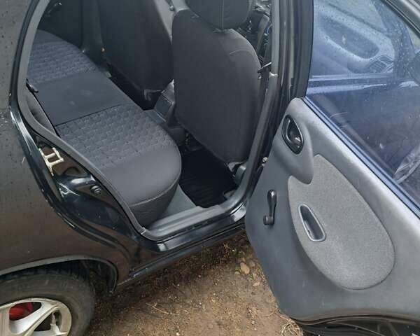 Черный Дэу Ланос, объемом двигателя 1.5 л и пробегом 158 тыс. км за 1250 $, фото 13 на Automoto.ua