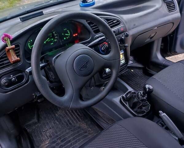 Черный Дэу Ланос, объемом двигателя 1.5 л и пробегом 289 тыс. км за 1700 $, фото 10 на Automoto.ua