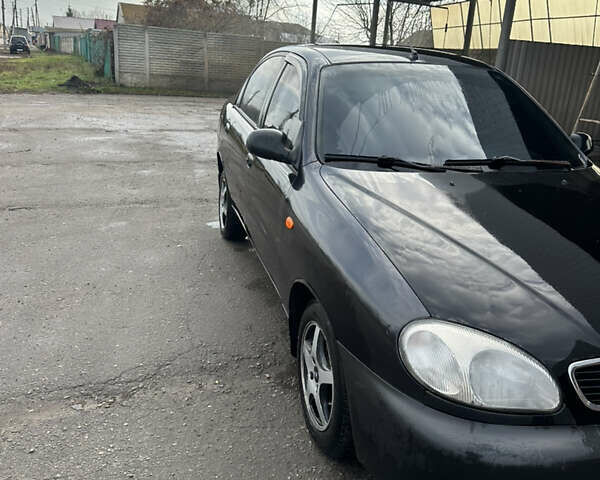 Чорний Деу Ланос, об'ємом двигуна 1.5 л та пробігом 150 тис. км за 1700 $, фото 6 на Automoto.ua