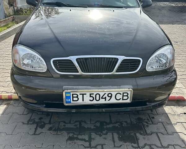 Чорний Деу Ланос, об'ємом двигуна 1.5 л та пробігом 230 тис. км за 3000 $, фото 1 на Automoto.ua