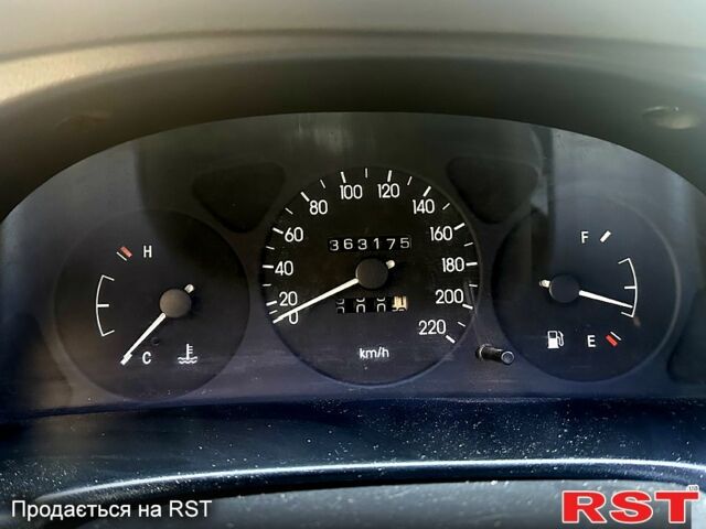 Чорний Деу Ланос, об'ємом двигуна 1.5 л та пробігом 363 тис. км за 1420 $, фото 6 на Automoto.ua