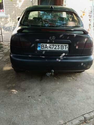 Черный Дэу Ланос, объемом двигателя 1.5 л и пробегом 236 тыс. км за 2300 $, фото 7 на Automoto.ua