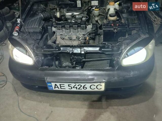 Черный Дэу Ланос, объемом двигателя 1.5 л и пробегом 337 тыс. км за 2600 $, фото 6 на Automoto.ua