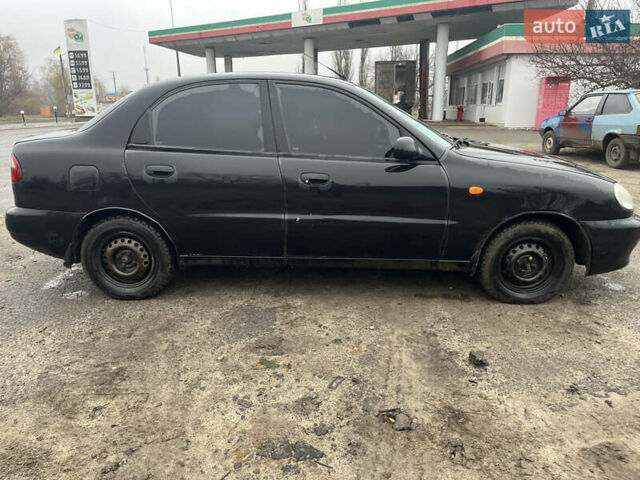 Черный Дэу Ланос, объемом двигателя 1.5 л и пробегом 201 тыс. км за 1000 $, фото 2 на Automoto.ua