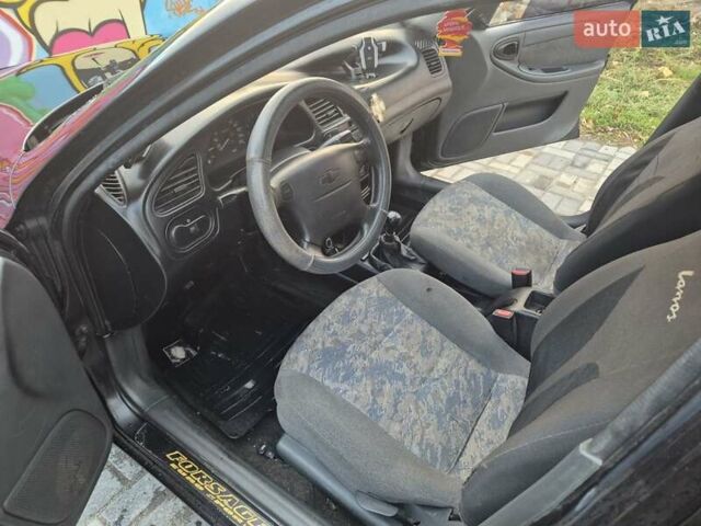 Деу Ланос 2007 у Новомосковске на Automoto.ua Чорний Деу Ланос, об'ємом двигуна 1.5 л та пробігом 252 тис. км за 2500 $, фото 11 на Automoto.ua