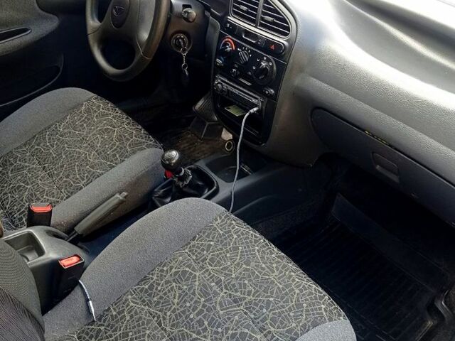 Чорний Деу Ланос, об'ємом двигуна 1.5 л та пробігом 0 тис. км за 1250 $, фото 3 на Automoto.ua