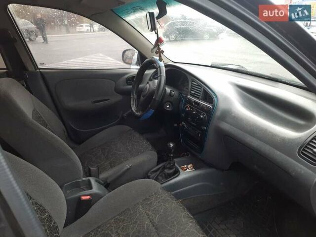 Дэу Ланос 2007 в Днепре (Днепропетровске) на Automoto.ua Черный Дэу Ланос, объемом двигателя 1.5 л и пробегом 205 тыс. км за 2100 $, фото 6 на Automoto.ua