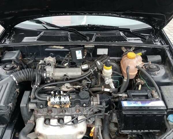 Черный Дэу Ланос, объемом двигателя 1.5 л и пробегом 224 тыс. км за 1499 $, фото 15 на Automoto.ua