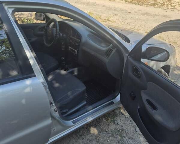 Черный Дэу Ланос, объемом двигателя 1.5 л и пробегом 255 тыс. км за 2500 $, фото 12 на Automoto.ua