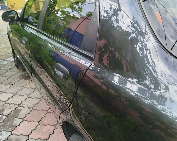 Черный Дэу Ланос, объемом двигателя 1.5 л и пробегом 270 тыс. км за 2850 $, фото 8 на Automoto.ua