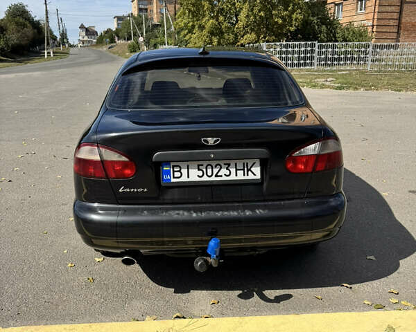 Черный Дэу Ланос, объемом двигателя 1.5 л и пробегом 175 тыс. км за 2800 $, фото 5 на Automoto.ua