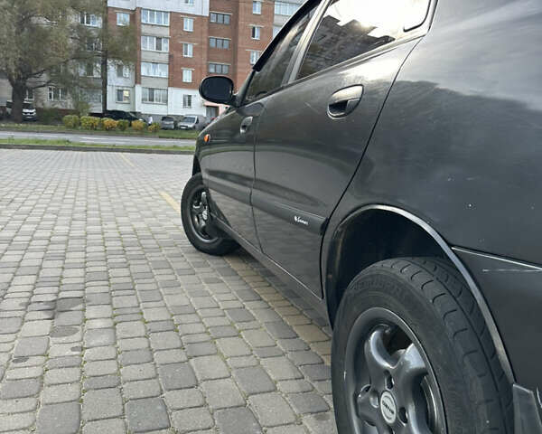 Чорний Деу Ланос, об'ємом двигуна 1.5 л та пробігом 181 тис. км за 1888 $, фото 4 на Automoto.ua