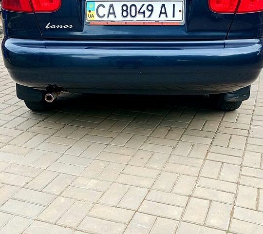 Черный Дэу Ланос, объемом двигателя 1.5 л и пробегом 262 тыс. км за 2200 $, фото 1 на Automoto.ua