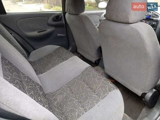Черный Дэу Ланос, объемом двигателя 1.5 л и пробегом 141 тыс. км за 1700 $, фото 6 на Automoto.ua