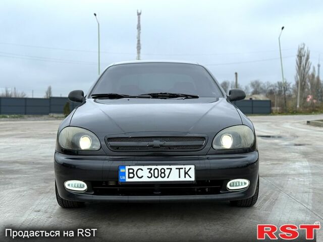 Чорний Деу Ланос, об'ємом двигуна 1.5 л та пробігом 240 тис. км за 2750 $, фото 1 на Automoto.ua