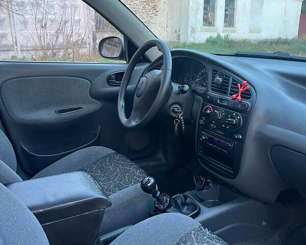 Деу Ланос 2007 у Черняхове на Automoto.ua Чорний Деу Ланос, об'ємом двигуна 1.5 л та пробігом 113 тис. км за 2700 $, фото 8 на Automoto.ua