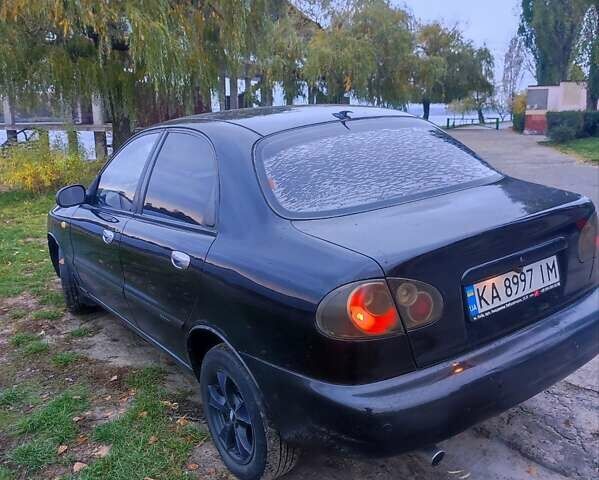 Черный Дэу Ланос, объемом двигателя 1.5 л и пробегом 289 тыс. км за 1700 $, фото 3 на Automoto.ua