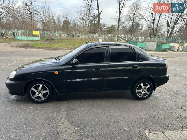 Чорний Деу Ланос, об'ємом двигуна 1.5 л та пробігом 150 тис. км за 1700 $, фото 2 на Automoto.ua