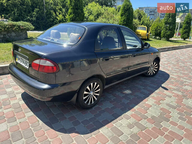 Черный Дэу Ланос, объемом двигателя 1.5 л и пробегом 111 тыс. км за 2890 $, фото 2 на Automoto.ua