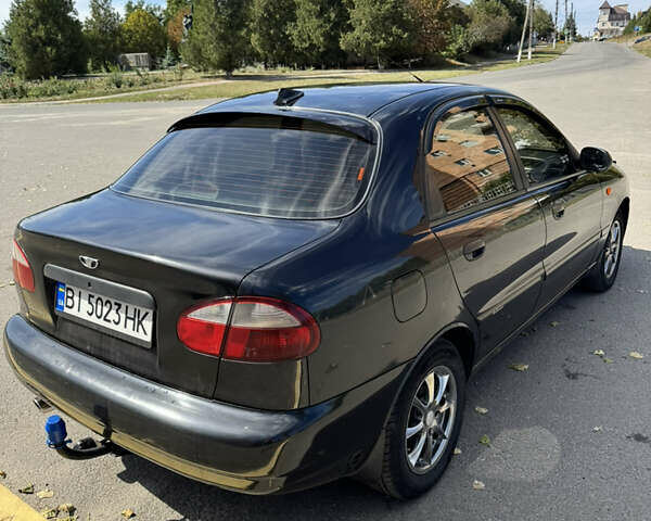 Черный Дэу Ланос, объемом двигателя 1.5 л и пробегом 175 тыс. км за 2800 $, фото 6 на Automoto.ua