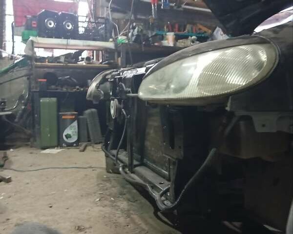 Черный Дэу Ланос, объемом двигателя 1.5 л и пробегом 337 тыс. км за 2600 $, фото 5 на Automoto.ua