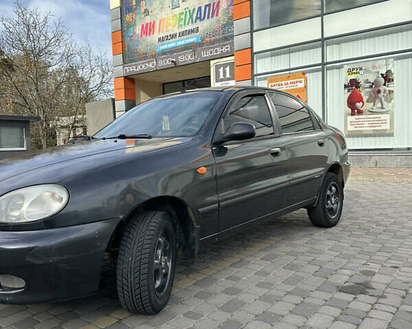 Чорний Деу Ланос, об'ємом двигуна 1.5 л та пробігом 181 тис. км за 1888 $, фото 3 на Automoto.ua