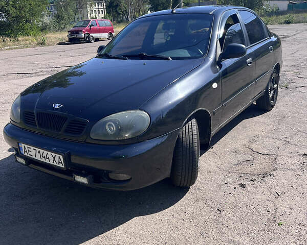 Черный Дэу Ланос, объемом двигателя 1.5 л и пробегом 178 тыс. км за 2600 $, фото 1 на Automoto.ua