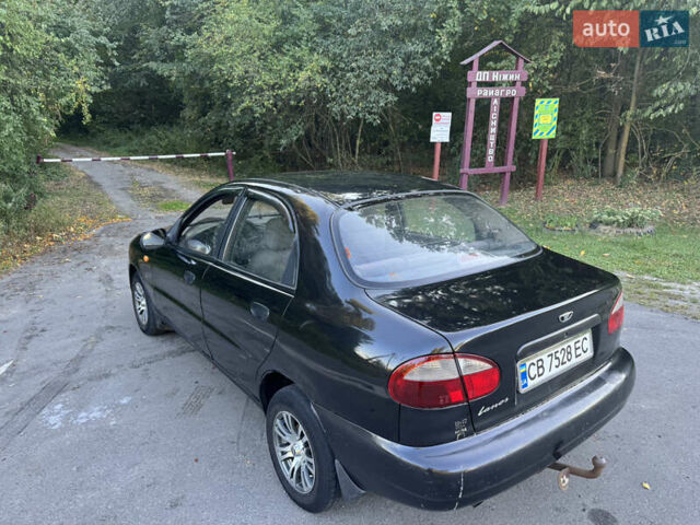 Чорний Деу Ланос, об'ємом двигуна 1.5 л та пробігом 200 тис. км за 1350 $, фото 6 на Automoto.ua